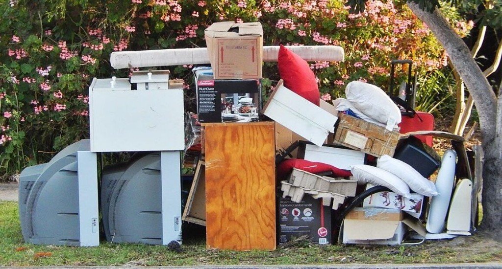 Residential junk and large items at the curb, ready for professional pickup